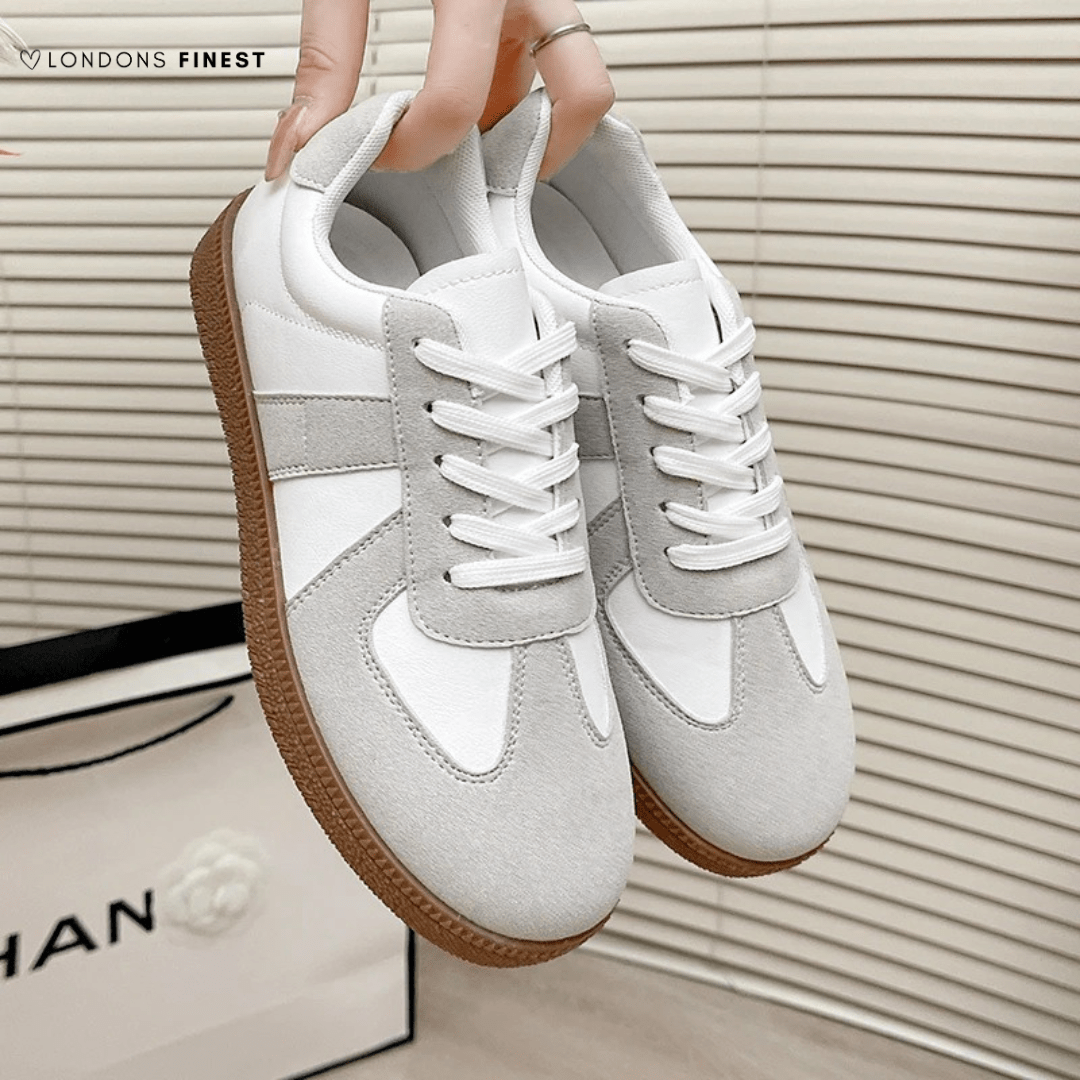 Women's orthopedic shoes featuring ergonomic arch support and cushioning, designed for breathability and comfort in a stylish casual design. 0